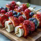 Red, white, and blue fruit skewers perfect for summer holidays and family gatherings.  