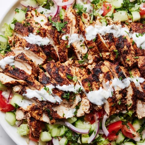 Freshly chopped parsley and thinly sliced red onion add bright pops of flavor to this hearty, gluten-free Chicken Shawarma Salad.
