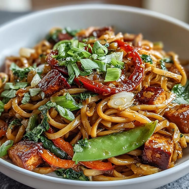 A mouthwatering sweet and spicy noodle bowl, perfectly balanced for a quick, flavorful meal.